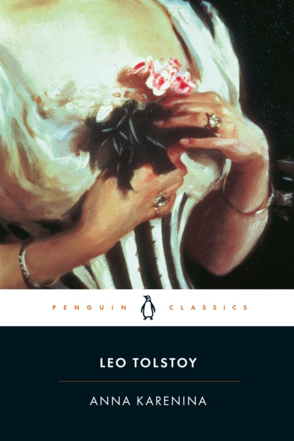 Book cover of 'Anna Karenina' by Leo Tolstoy with a close-up of a hand holding a bouquet.