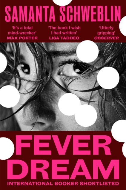 Book cover of 'Fever Dream' by Samanta Schweblin with a woman's eye and white circles.
