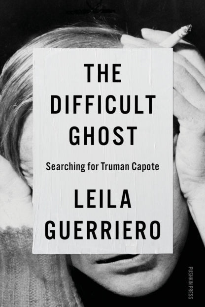 Book cover of 'The Difficult Ghost: Searching for Truman Capote' by Leila Guerriero with a person holding the book.