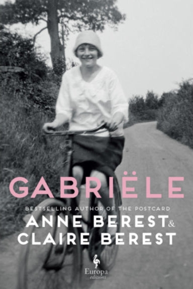 Book cover with a black and white photo of a woman on a bicycle and pink text.