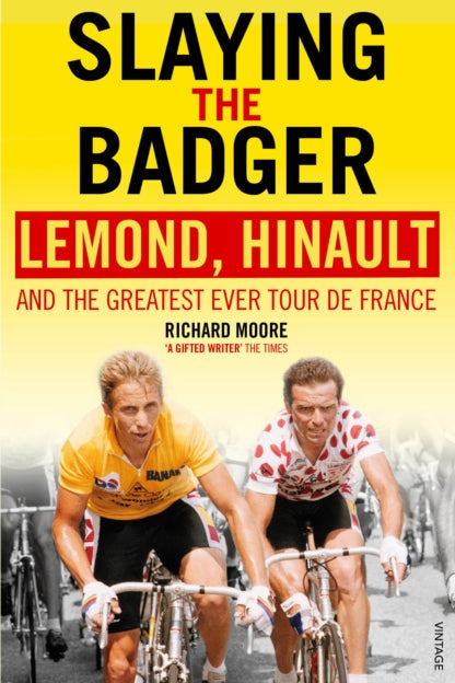Book cover of 'Slaying the Badger' with two cyclists on a yellow background