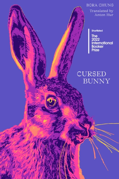 Book cover of 'Cursed Bunny' with a stylized rabbit illustration on a purple background