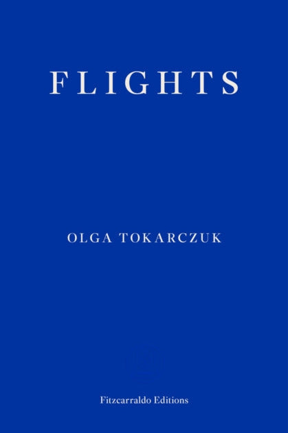 Book cover of 'Flights' by Olga Tokarczuk with a blue background