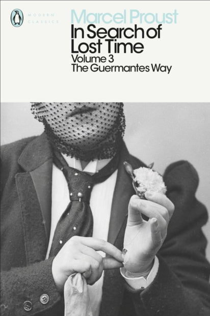 Book cover of 'In Search of Lost Time' by Marcel Proust, Volume 3 with a black and white photo of a person holding a flower.