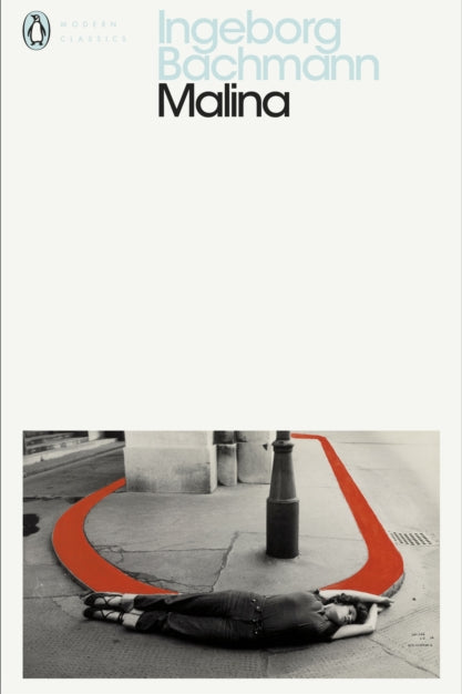 Book cover of 'Malina' by Ingeborg Bachmann with a black and white photo of a person lying on the ground.