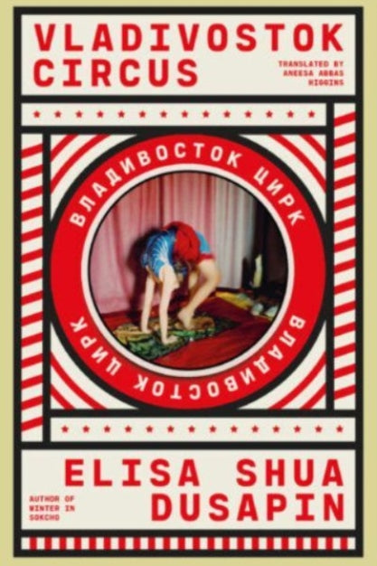 Book cover of 'Vladivostok Circus' by Elisa Shua Dusapin with a red and white striped border.